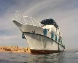 Dive boat approaching from the water SD Footage