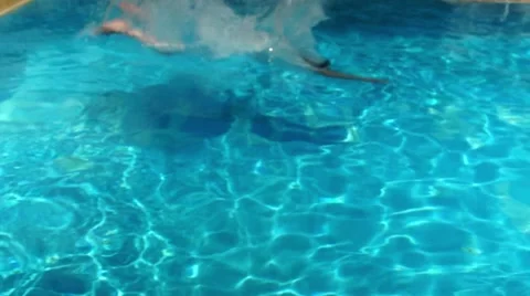 Dive into outdoor swimming pool. Stock Footage 40883061