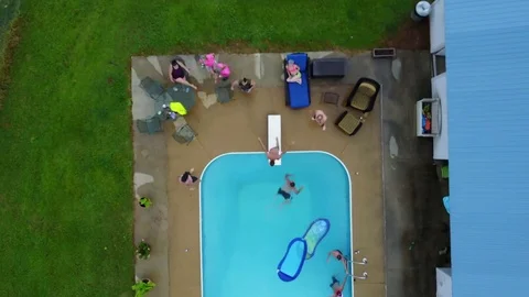 Dive In pool from the air Stock Footage 78411108