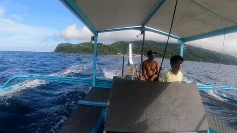 Divemaster and boat captain during a scuba diving excursion Stock Footage 122518680