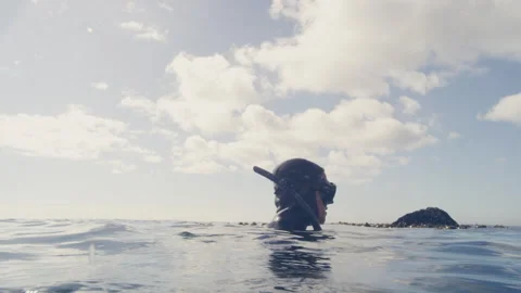 Diver above the sea level Stock Footage 279421966
