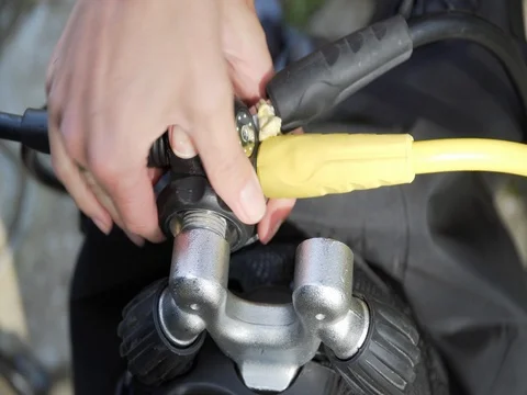 Diver assembles scuba close-up Stock Footage 78549186