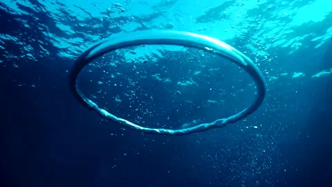 Diver Blow Bubble Rings while Freediving Cape Palos Cartagena Murcia Spain Stock Footage 130909658