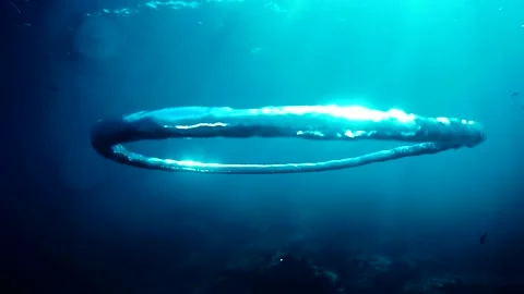 Diver Blow Bubble Rings while Freediving Cape Palos Cartagena Murcia Spain Stock Footage 130909683