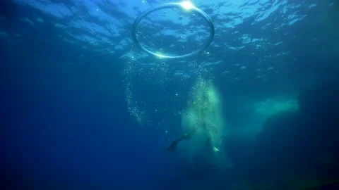 Diver Blow Bubble Rings while Freediving Cape Palos Cartagena Murcia Spain Stock Footage 130909710