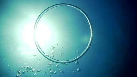 Diver Blow Bubble Rings while freediving in Spain Stock-Footage 130912139