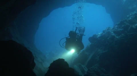 Diver in a cave Stock Footage