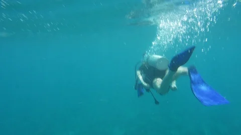 Diver Diving Away From The Camera Stock Footage 125803168