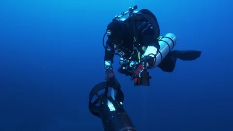Diver with DPV (Diving Propulsion Vehicle),Ustica, Mediterranean sea Stock Footage 126734518