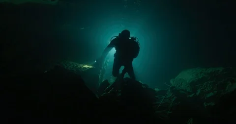 Diver exploring an underwater cave, Gramat, France Stock Footage 104242146
