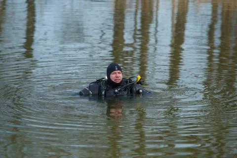 Diver floating in the water Stock Photos