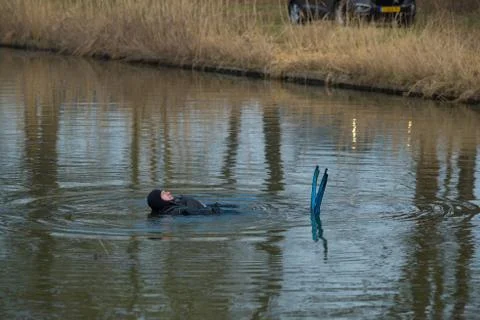 Diver floating in the water Stock Photos