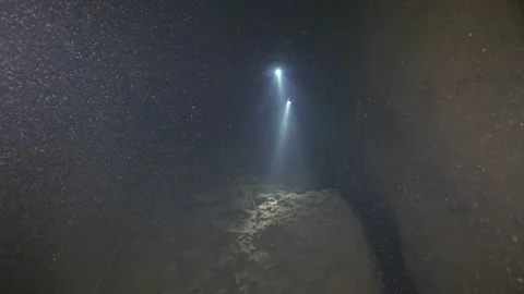 Diver follows guideline on the bottom of the cave underwater,Amaseno,Italy Stock Footage 224766742