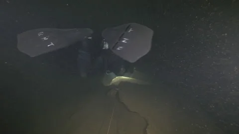 Diver follows guideline on the bottom of the cave underwater,Amaseno,Italy Stock Footage 224840175