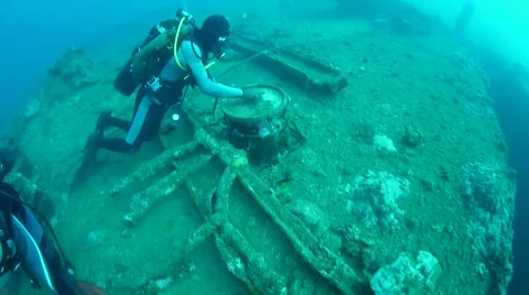 Diver going through bin at Ship Wreck Stock Footage 40731800