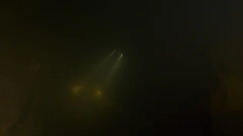 Diver illuminates the rocks of the cave, Risorgenza Amaseno, Italy Stock Footage 109170613