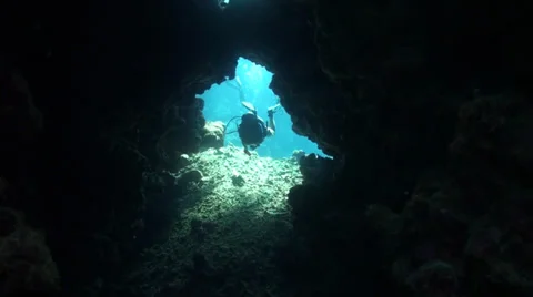 Diver inside cavern Stock Footage 33531561