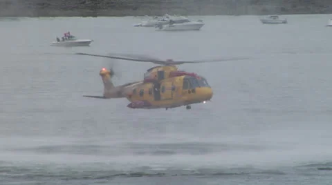 Diver jumps from helicopter hovering Stockbeeldmateriaal 24352093