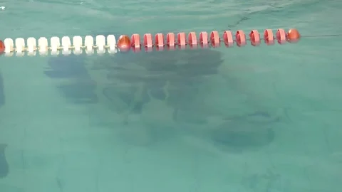 A diver learns to fasten and remove objects from the water. Video stock 124731408