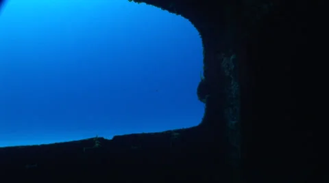 Diver With Light Looking into Wreck Stock Footage 36373328