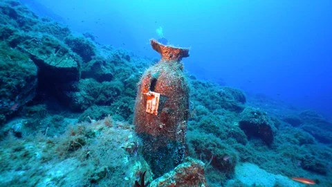 Diver looking a Amphora on the seabed Stock Footage 127986449