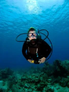 Diver looking into the camera Foto stock