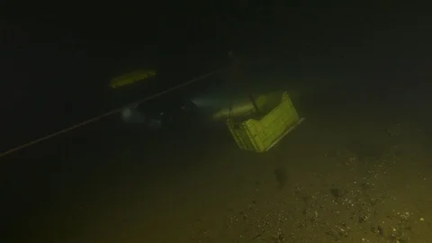 Diver passes the box and arrives to the stake marks way, Albano lake, Italy Stock Footage 107346771