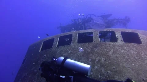 Diver photographing of shipwreck Stock Footage 63462702