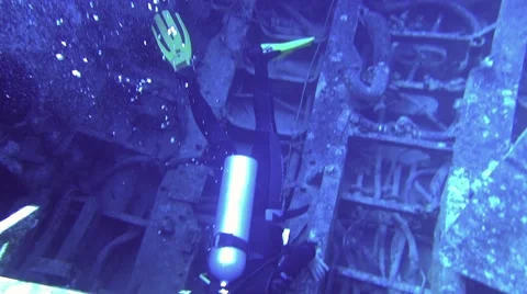 Diver photographing of shipwreck Stock Footage 63462737