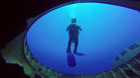 Diver photographing of shipwreck Stock Footage 63462738