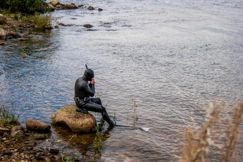 Diver preparing to dive Stock Photos