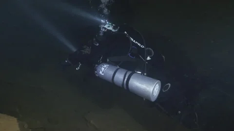 Diver in profile shot explores the walls of the underwater cave,Amaseno,Italy Stock Footage 224848763