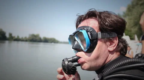 Diver putting his snorkel on Stock Footage 48383501