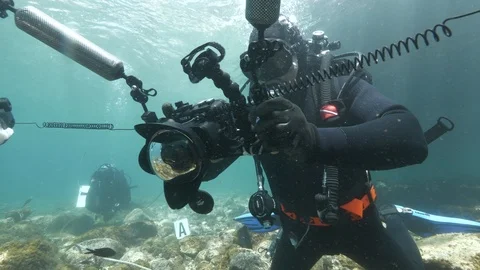 Diver recovers tool for simulating an underwater nera dummy,Ustica,Med sea Stock Footage 124143132