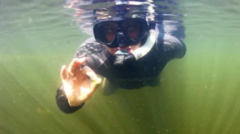 Diver in the river Stock Footage 8680361