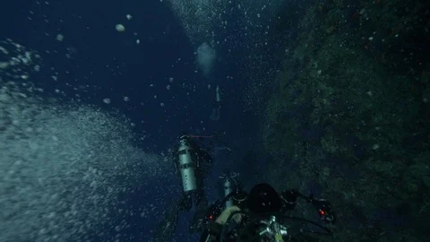 Diver swim next to coral reef doing so many bubbles, Ras Mohammed,Red Sea,Egypt Stock Footage 105592062