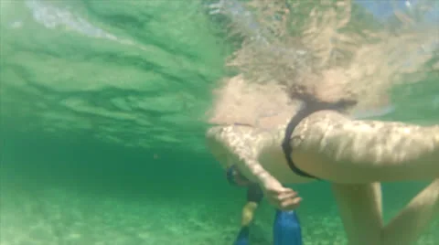Diver swimby 50% Stock Footage 24301119