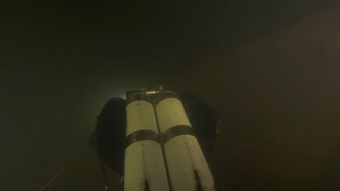 Diver swims stretching out the guide line in the cave, Risorgenza Amaseno, Italy Stock Footage 109168616