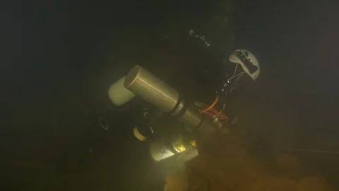 Diver ties guide line, Risorgenza Capo d'Acqua, Amaseno, Italy Stock Footage 108980078