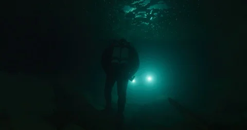 Diver walking in an underwater cave, Gramat, France Stock Footage 104242566