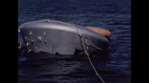 Divers assist during Apollo 8 back-up crew command module water egress training  Stock Footage 271518763