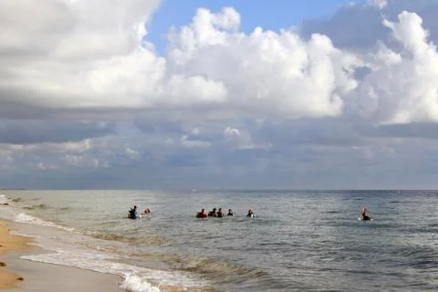 Divers off the coast Stock Photos