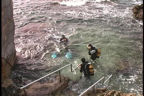 Divers Descending Into Mediterranean  Stock Footage 118331