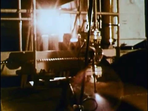 Divers enter an ocean floor diving station and begin compression as an officer 動画素材 74876486