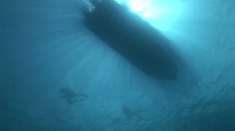 Divers Enter the Water from a Boat Stock Footage 53278178