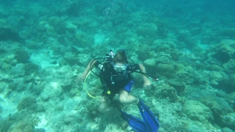 Divers Facing The Gravity In Water Stock Footage 125803495