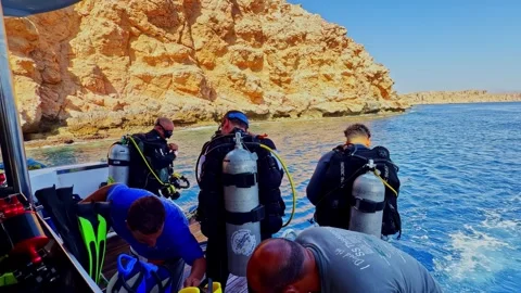 Divers getting ready for dive in Red Sea... | Stock Video | Pond5