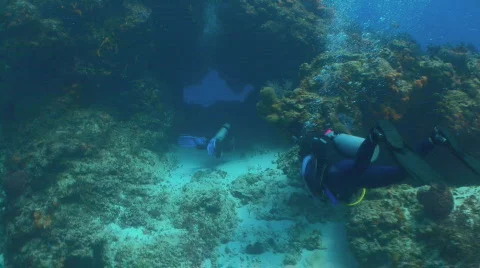 Divers going into cave Santa Rosa Stock Footage 636257