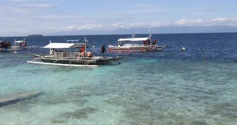 Divers on Outrigger Stock Footage 125126046