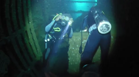 Divers playing with gas masks Stock Footage 40731846